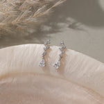 STMG Pear Cut  Diamond Dangle Earrings in silver