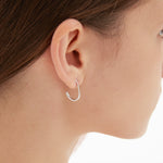 Droplet Hook Earrings in silver on ear