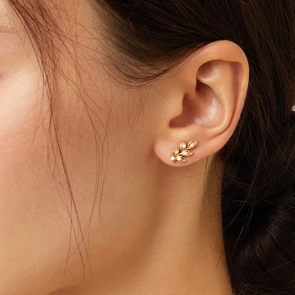 STMG Olive Leaf Stud Earrings in gold on ear